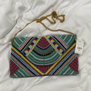 Francesa’s multicolor clutch with chain